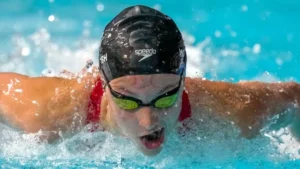 Competitive swimmer racing the butterfly leg streaming live on USATVStream