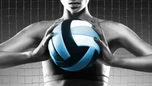 Volleyball player set to serve at the net streaming live on USATVStream